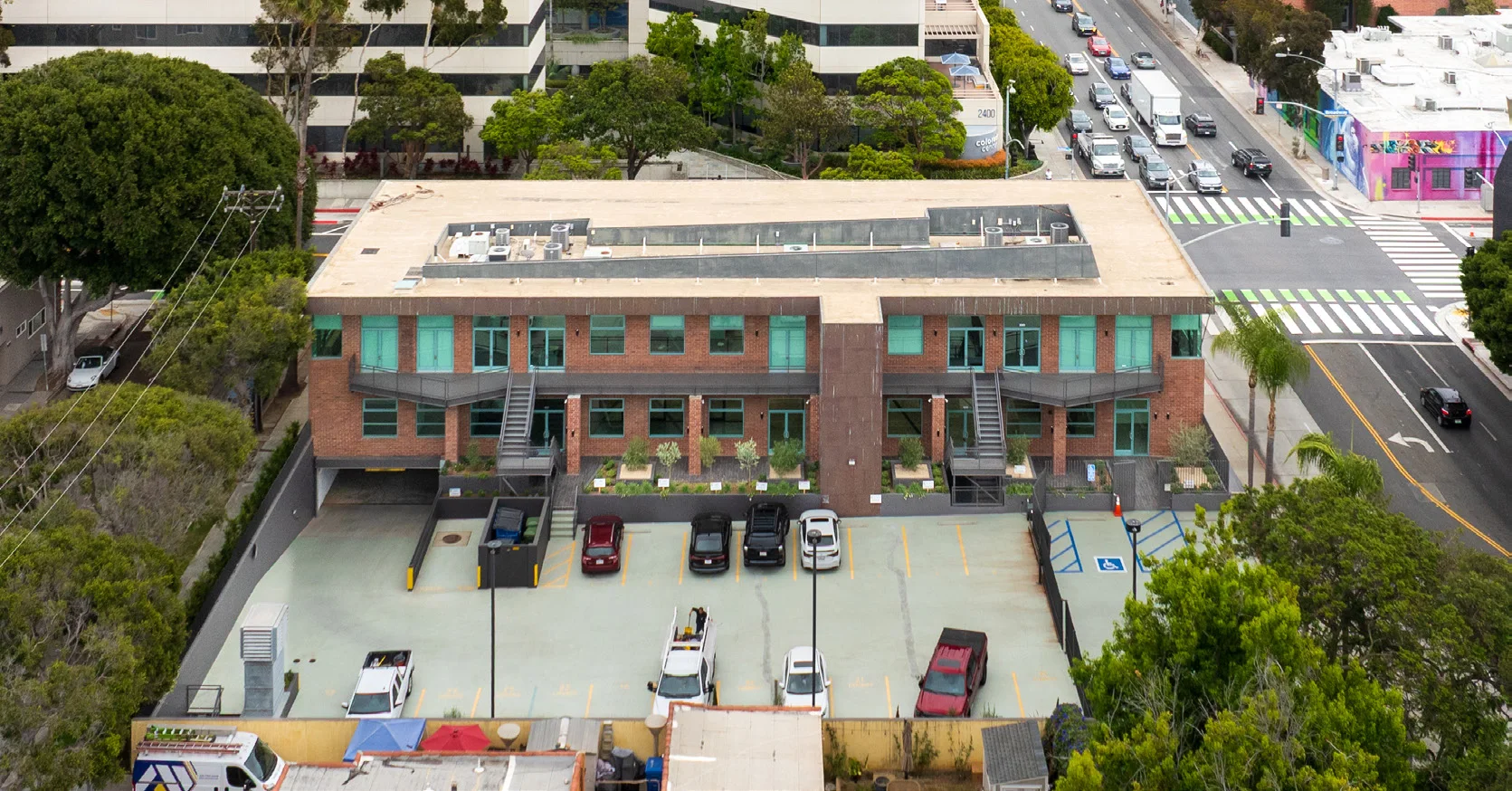 Aerial view of the 1447 Cloverfield building and parking court
